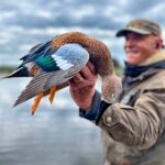 Ramsey Russell with red shoveler in argentina