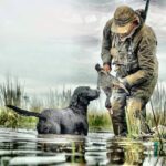 Ramsey Russell and his char dawg best argentina duck hunt for rosy billed Pochards